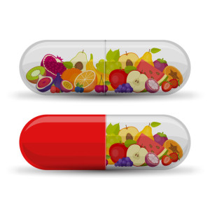 Medical capsule with fruit. Vitamins and supplements. Different