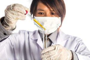 Scientist exam test tube on white background
