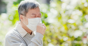 old man cough outdoor