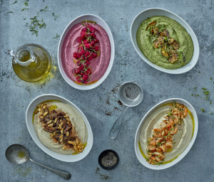 Top view of different types of hummus